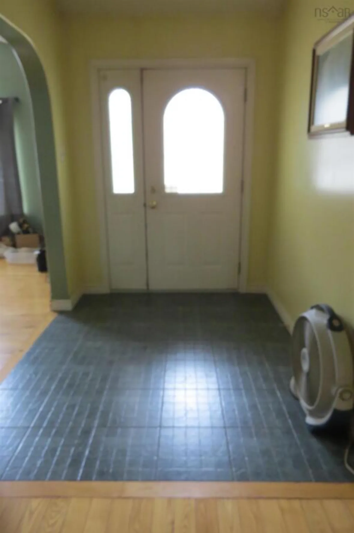 Gail Avenue — Foyer, before the renovation by MAD Design Interiors
