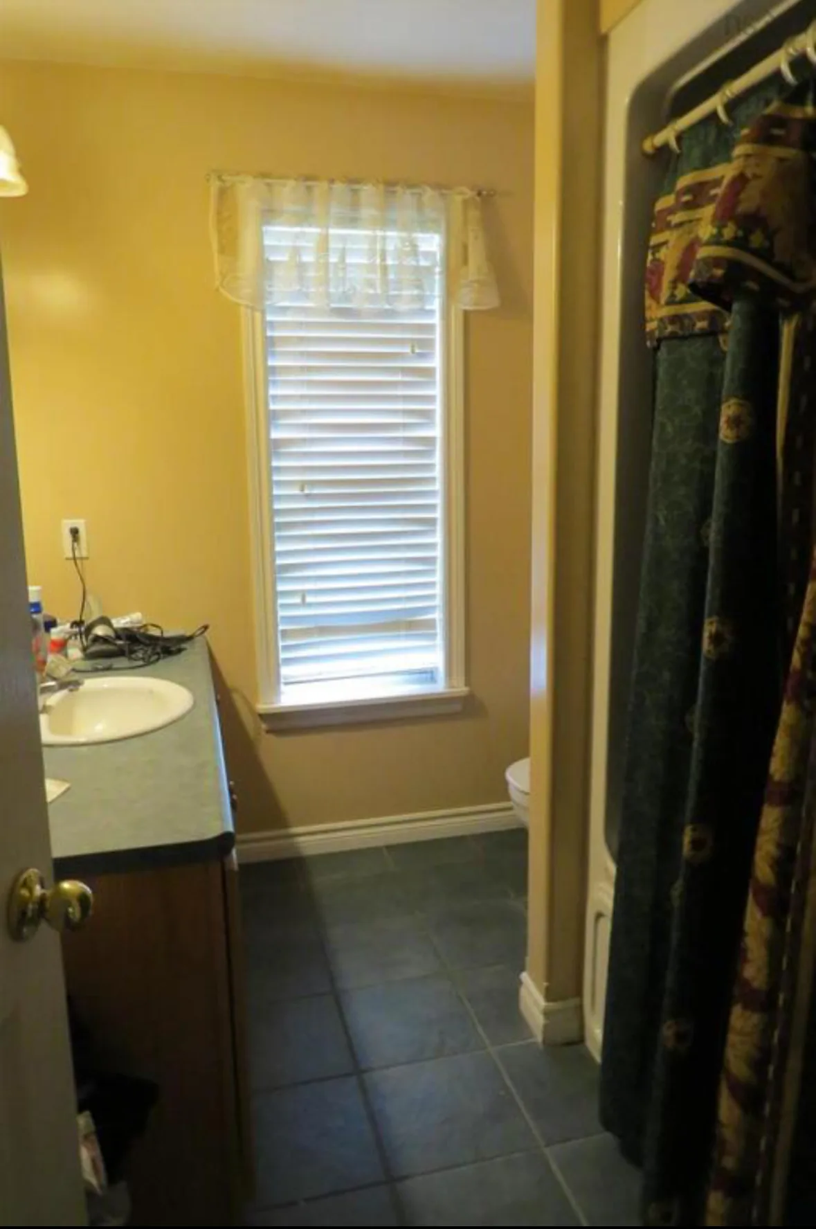Gail Avenue — Main Bath, before the renovation by MAD Design Interiors